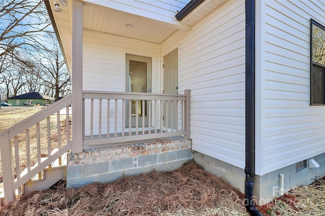 view of exterior entry with crawl space