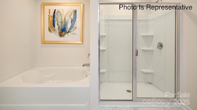 full bath with a garden tub and a shower stall