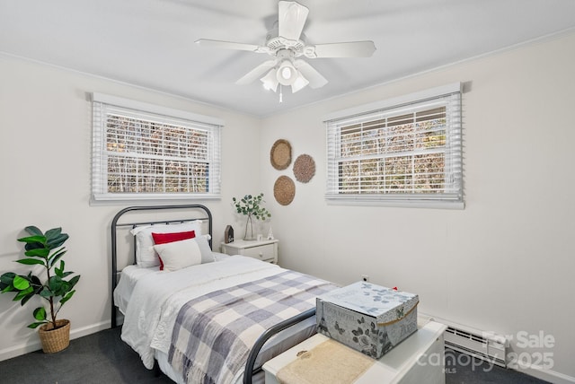 bedroom featuring a ceiling fan, carpet, baseboards, and crown molding