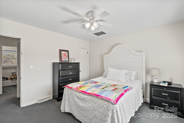 carpeted bedroom featuring ceiling fan, visible vents, and baseboards