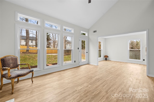 sunroom / solarium with visible vents and a wealth of natural light