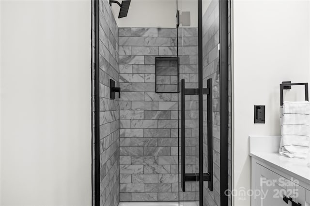 bathroom featuring a stall shower