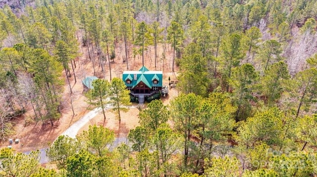 aerial view featuring a forest view