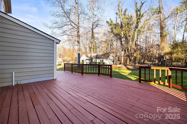 deck featuring a yard