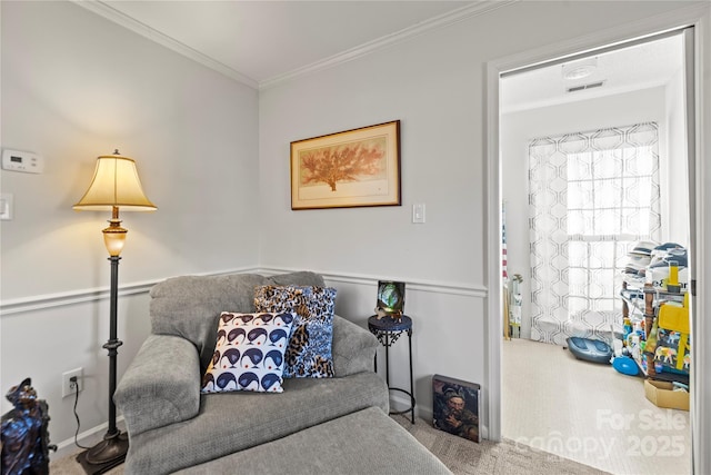 living room featuring carpet floors and ornamental molding