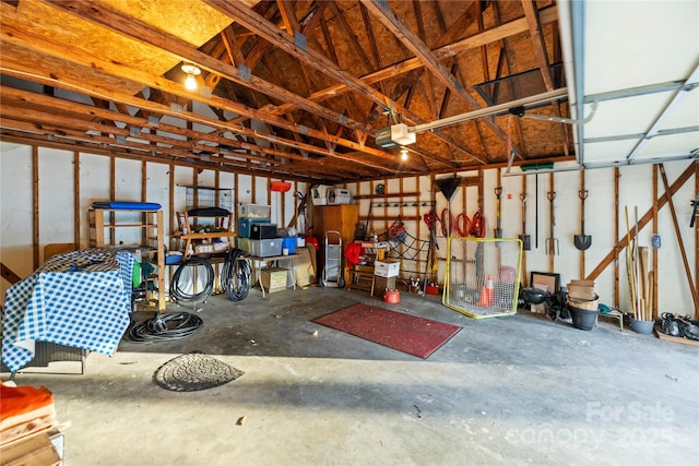 garage featuring a garage door opener