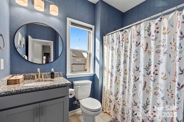 full bath with tile patterned flooring, vanity, toilet, and wallpapered walls