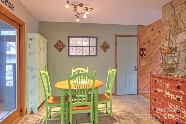 dining area featuring light tile patterned floors