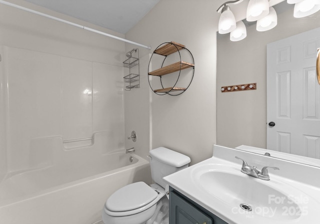 full bathroom with washtub / shower combination, vanity, and toilet