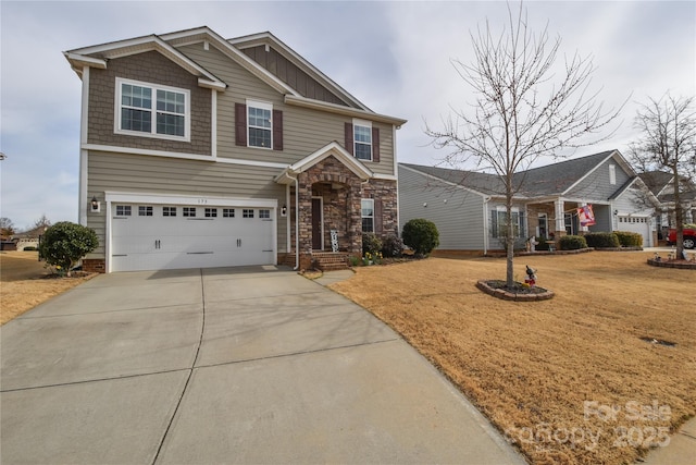 craftsman inspired home featuring an attached garage, stone siding, driveway, board and batten siding, and a front yard