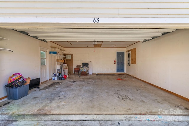 garage featuring baseboards