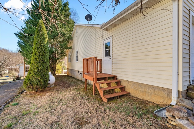 view of property exterior featuring crawl space