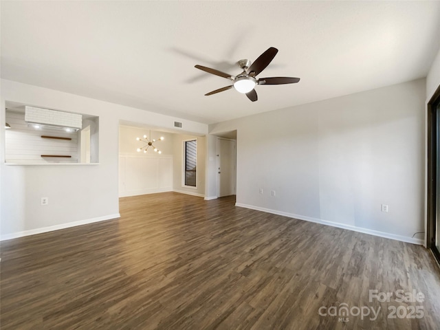 unfurnished living room with visible vents, baseboards, and dark wood-type flooring