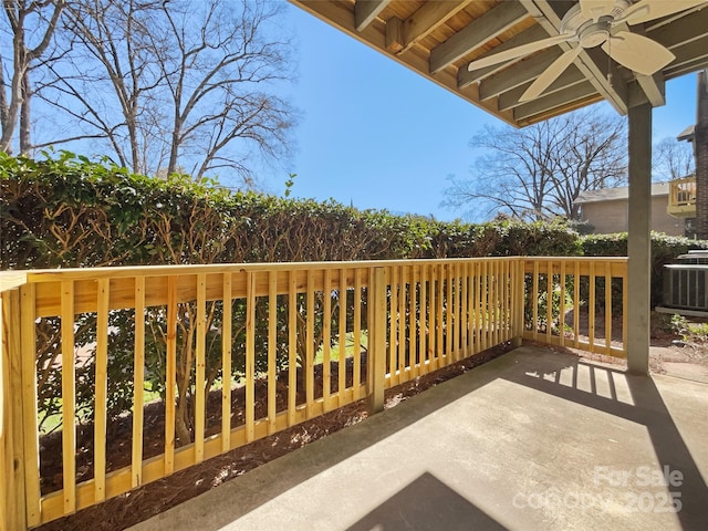 view of patio / terrace featuring cooling unit and a ceiling fan