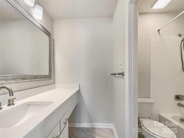 full bathroom featuring shower / bathtub combination, toilet, vanity, baseboards, and marble finish floor