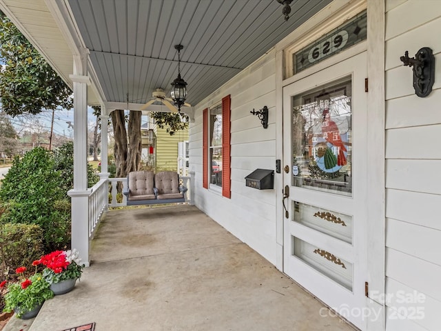 entrance to property with a porch