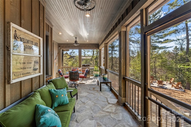 sunroom / solarium with wood ceiling