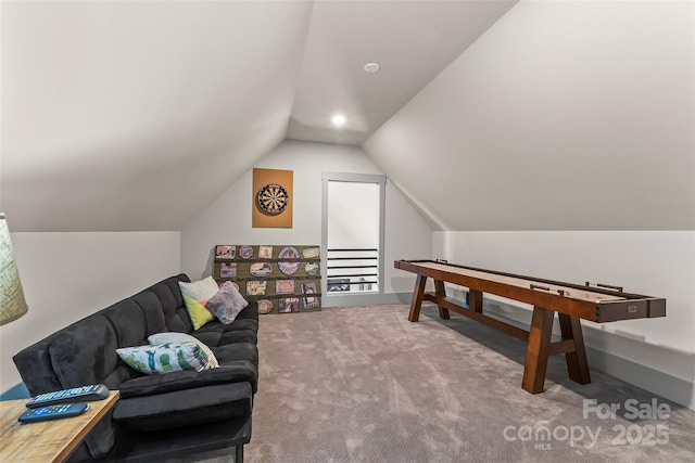 game room with vaulted ceiling and carpet floors