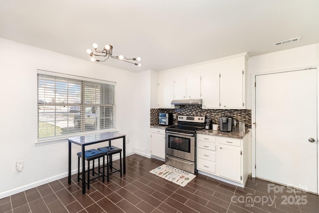 kitchen with under cabinet range hood, white cabinetry, visible vents, electric stove, and decorative backsplash