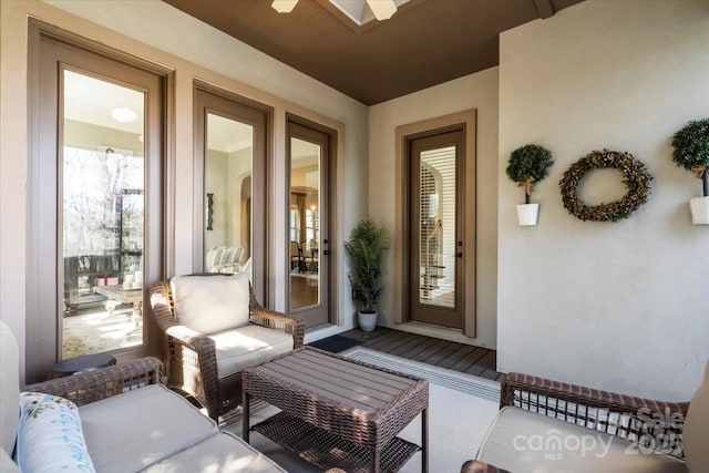 property entrance featuring stucco siding