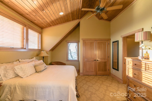 bedroom featuring light carpet, wooden ceiling, and multiple windows