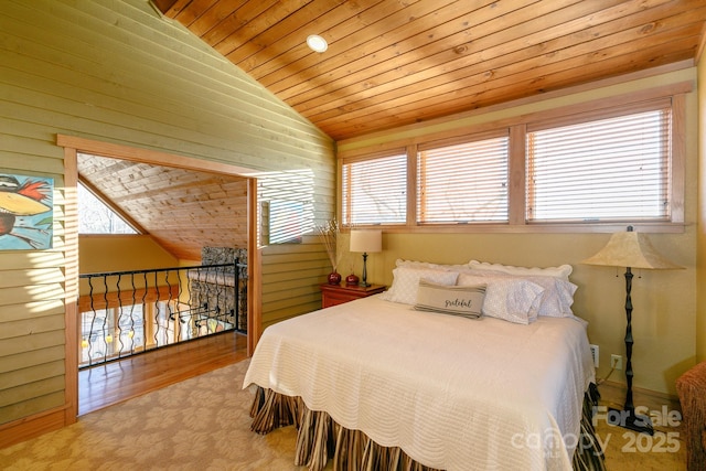 bedroom featuring wooden ceiling and vaulted ceiling