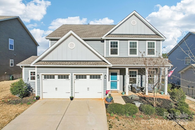 1426 Whitman Ct, York, SC 29745 - craftsman-style home featuring board and batten siding, covered porch, driveway, a garage, and roof with shingles