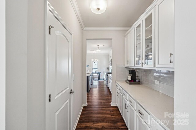 1426 Whitman Ct, York, SC 29745 - hall featuring crown molding and dark wood-style floors