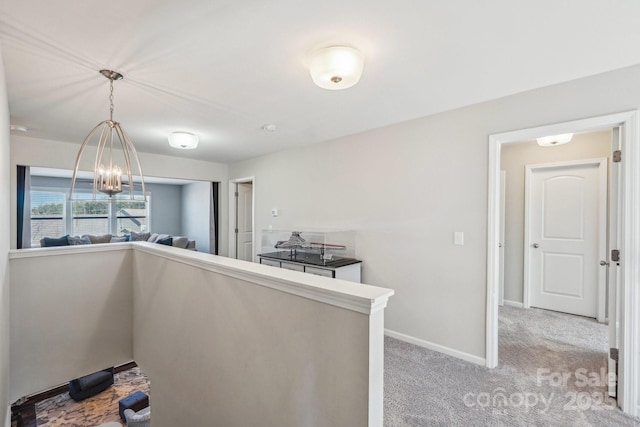 1426 Whitman Ct, York, SC 29745 - kitchen featuring light colored carpet, pendant lighting, and a chandelier