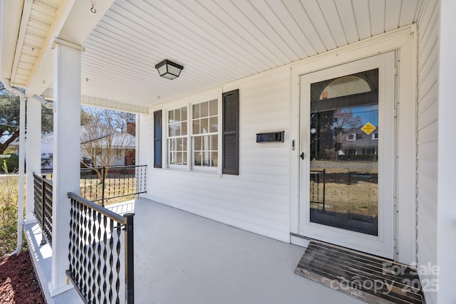 entrance to property with a porch