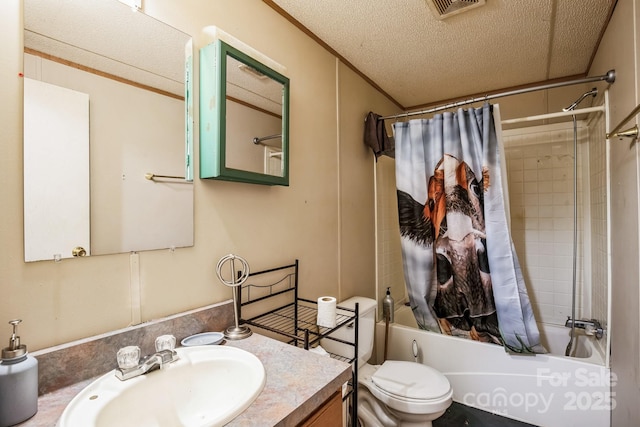 bathroom with crown molding, shower / bath combination with curtain, toilet, a textured ceiling, and vanity