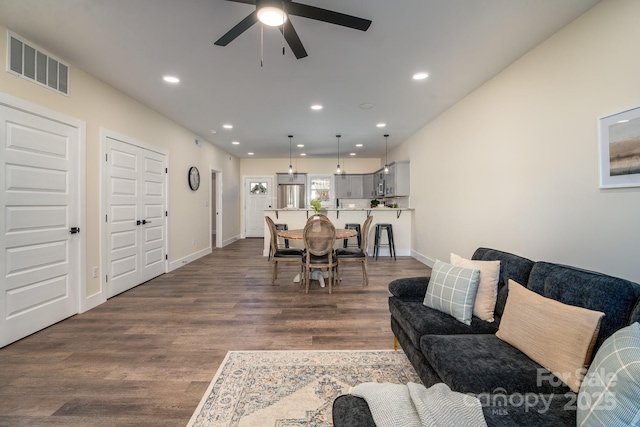 143 Carver St Unit 16, Brevard, NC 28712 - living area featuring recessed lighting, ceiling fan, dark wood-style floors, and baseboards
