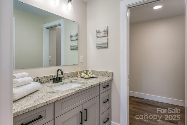 143 Carver St Unit 16, Brevard, NC 28712 - bathroom with wood finished floors, baseboards, vanity, and recessed lighting