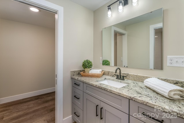 143 Carver St Unit 16, Brevard, NC 28712 - bathroom featuring baseboards, wood finished floors, and vanity