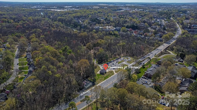 drone / aerial view with a forest view