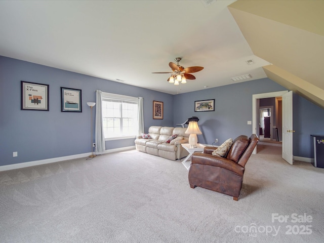 carpeted living room with baseboards, visible vents, and ceiling fan