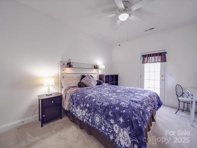 bedroom featuring a ceiling fan, carpet flooring, visible vents, and baseboards