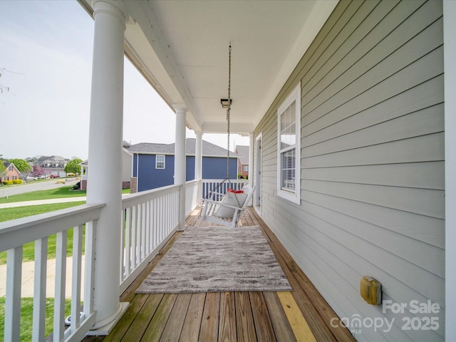 wooden deck featuring a porch