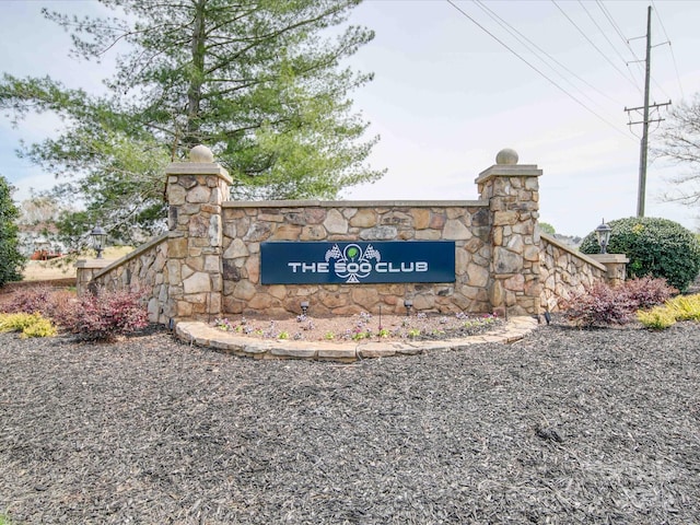 view of community sign