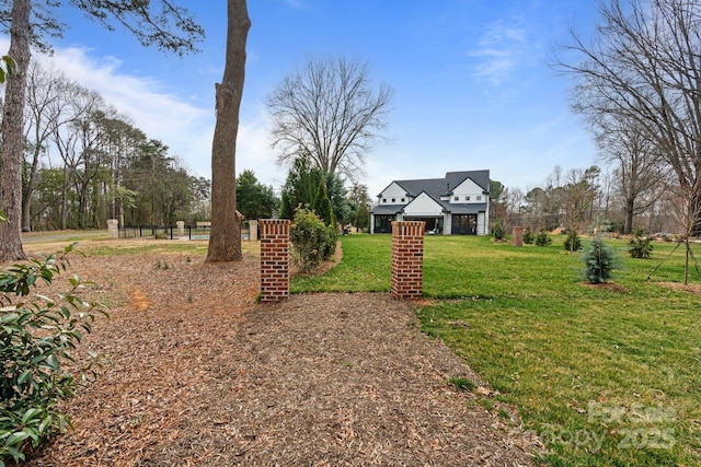 view of yard with fence