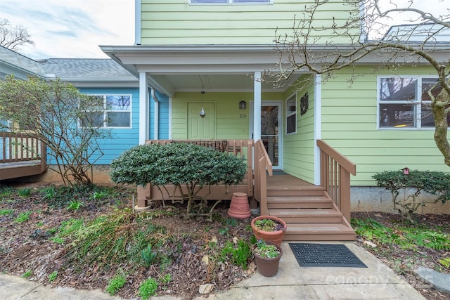 doorway to property with a porch