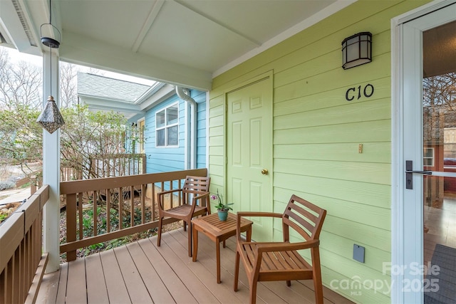 deck with covered porch