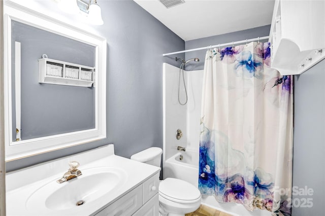 full bath with vanity, toilet, and shower / tub combo with curtain