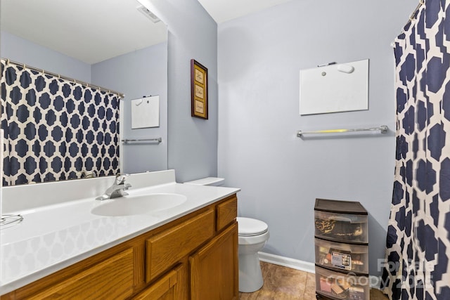 full bathroom with a shower with curtain, visible vents, vanity, and toilet