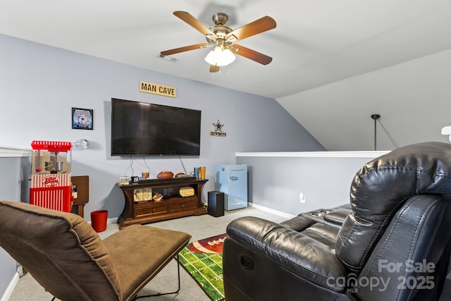 carpeted living area featuring ceiling fan, lofted ceiling, visible vents, and baseboards