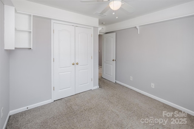 unfurnished bedroom featuring a closet, visible vents, ceiling fan, and baseboards