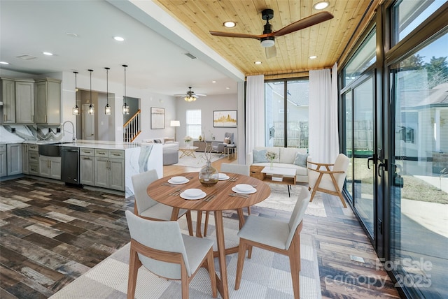 dining area with visible vents, dark wood-style floors, wood ceiling, stairs, and recessed lighting