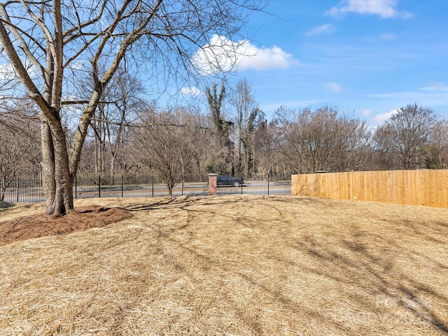 view of yard featuring fence