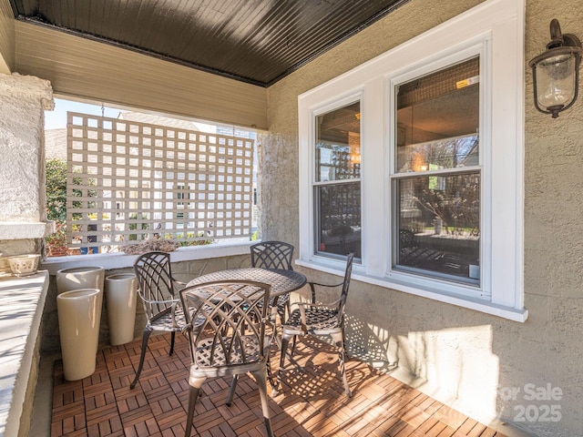 view of patio with outdoor dining area