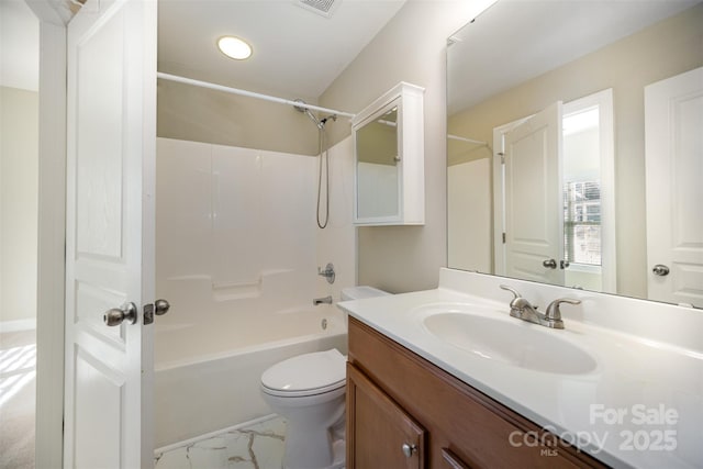 bathroom with visible vents, toilet, marble finish floor, vanity, and washtub / shower combination